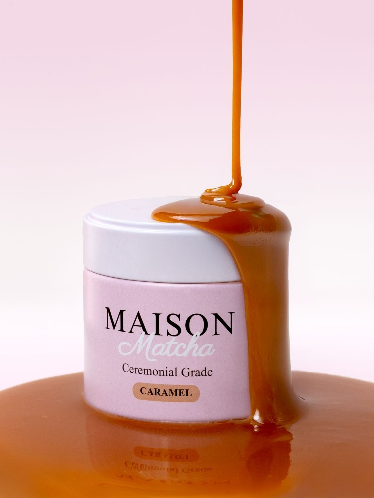 Ceremonial Caramel Matcha can drizzled with flowing caramel sauce