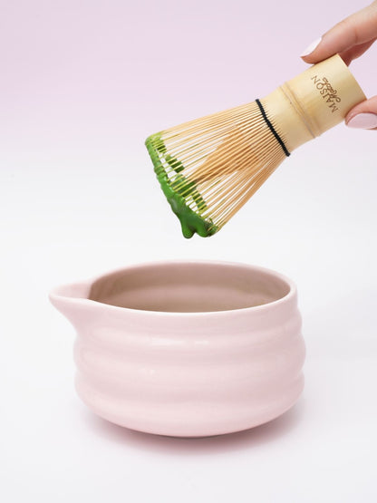 Maison Matcha bamboo whisk with matcha mixture dripping in bowl, best matcha whisk australia